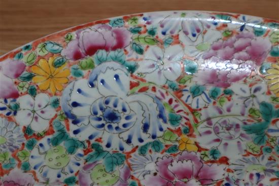 A Chinese famille rose thousand flower pattern dish, Republic period with Qianlong mark, diameter 33cm (a.f.)
